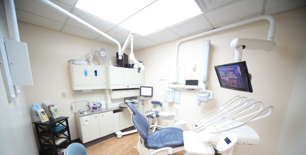 A dental treatment room at Al Care Dental in Leduc