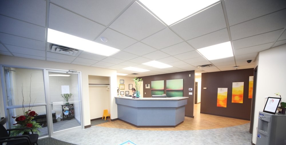 The front reception desk at Al Care Dental in Leduc
