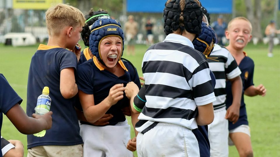 Young athletes playing a contact sport